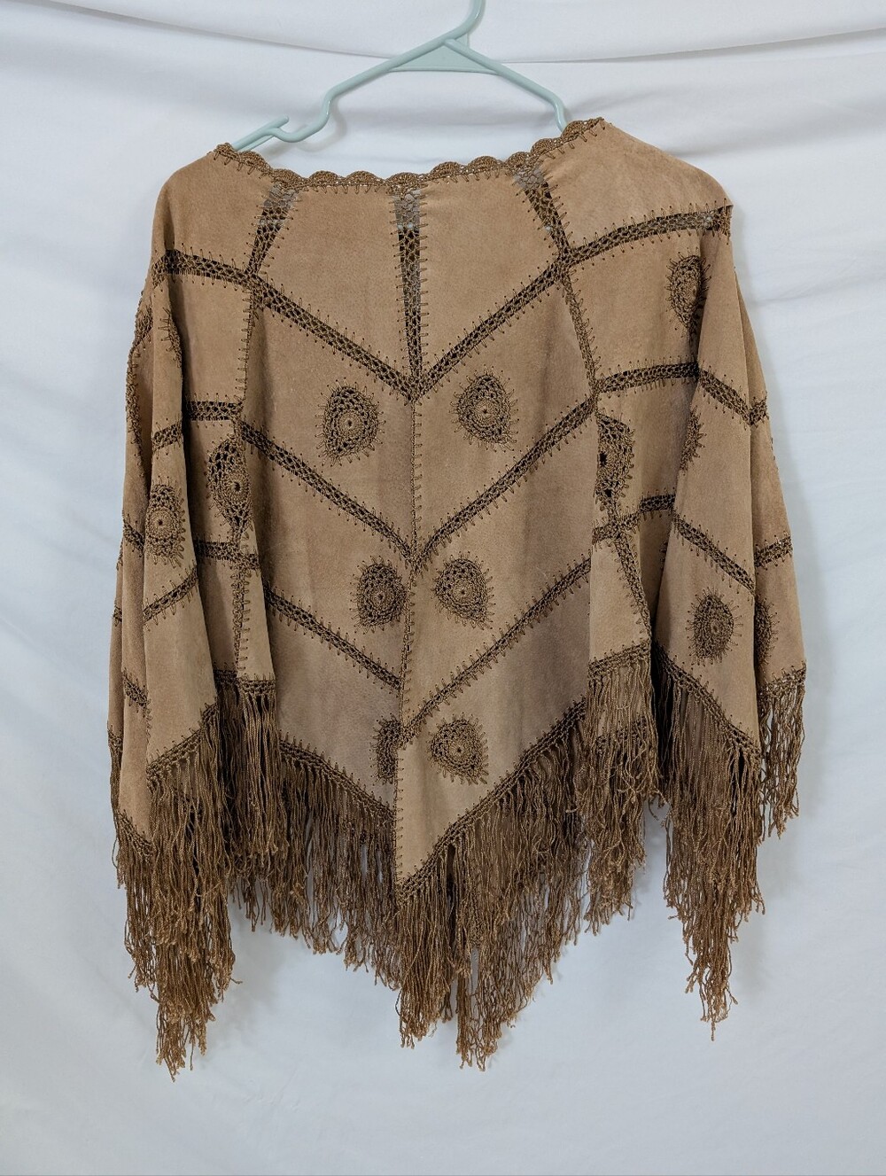Vintage Newport news tan leather poncho with fringe and embroidery